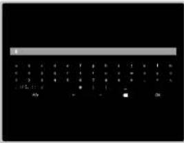 Scanned image of a black keyboard with white numeric keypad and control buttons at the bottom