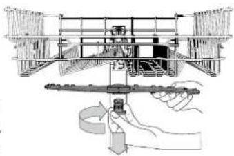 Technical line drawing of a mechanical assembly with a hand holding a tool, no visible text or symbols.