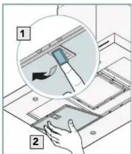 Diagram showing a hand inserting a component into a device, with labeled parts and an inset magnified view of the component.