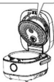 Line drawing of a toaster oven with fan and control panel (no text or symbols)