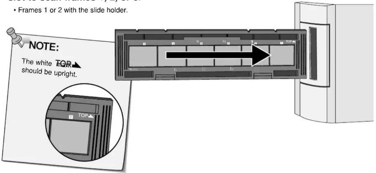 • Frames 1 or 2 with the slide holder. NOTE: The white TOP should be upright.