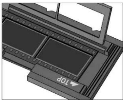 MINOLTA Dimâge Scan Dual I - Snap the film holder closed. - 1
