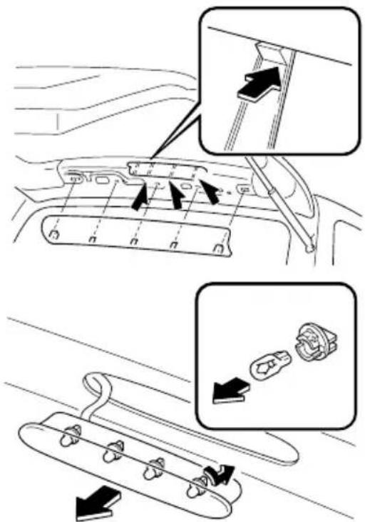 Diagram showing car interior seatbelt components with directional arrows and component placement instructions