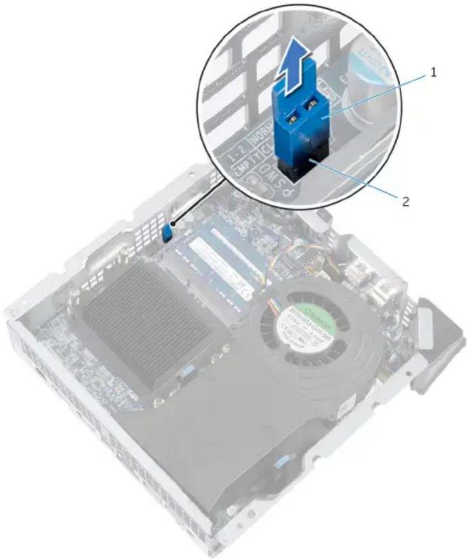 Diagram of a computer motherboard with labeled components and an inset showing a blue 3D component with an upward arrow.