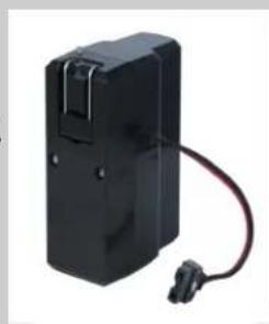 Black rectangular electronic device with a coiled cable, no visible text or symbols