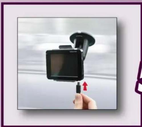 Hand holding a camera module with a red upward arrow, against a blurred background (no text or symbols visible)