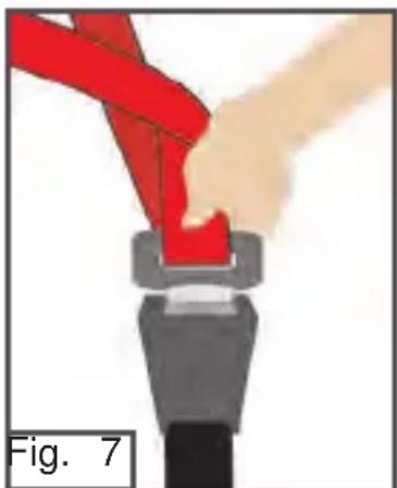 Illustration of a red ribbon being inserted into a black mechanical component (no text or symbols)