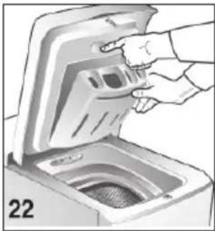 Illustration of a hand placing a component into a washing machine (no text or symbols visible)
