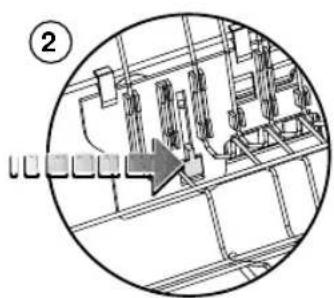 Diagram of a mechanical or electrical assembly with labeled components and an arrow indicating direction (no readable text or symbols)