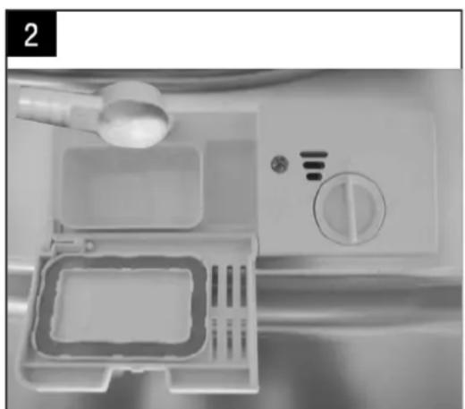 Interior view of a kitchen appliance with a plastic tray, handle, and control panel (no visible text or symbols)
