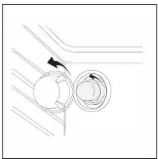 Diagram of a mechanical component with two circular parts and an arrow indicating rotation (no text or symbols)