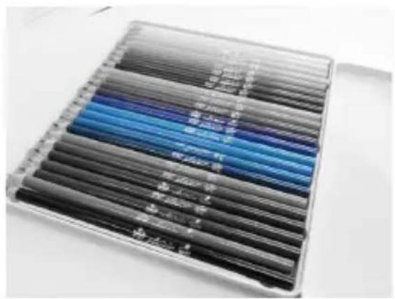 Stacked medical or laboratory test tubes with Chinese labels, showing blue and gray color coding for test design.