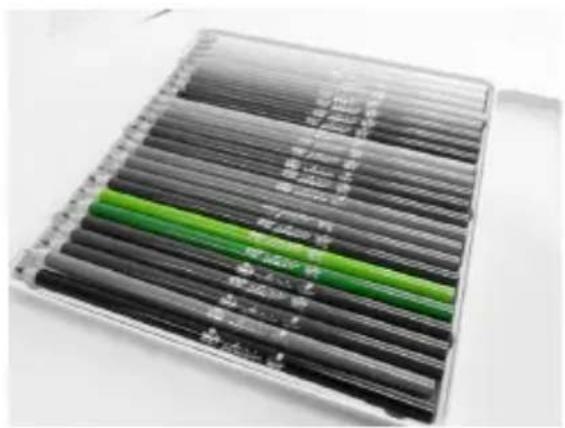 Stack of black and green striped paper strips with Chinese text labels, likely a product or packaging sample.