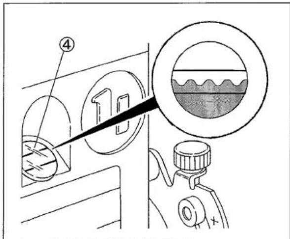 Diagram illustrating a mechanical device with labeled components and a magnified view showing internal structure.