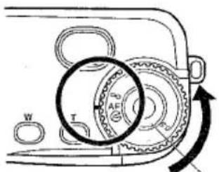 Technical diagram showing gear mechanism with labeled components and rotation arrow