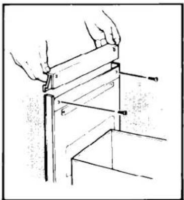 Technical line drawing of a mechanical assembly with hands holding parts (no text or symbols)