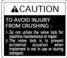 CAUTION TO AVOID INJURY FROM CRUSHING : 1.Do not utilize the valve lock for machine maintenance or repair. 2.The valve lock is to prevent accidental actuation when implement is not in use or during transport.