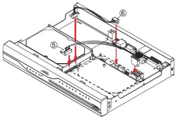 Technical diagram of a computer drive showing labeled components and red arrows indicating assembly or connection points.