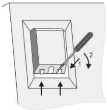 Diagram showing a tool interacting with a 3D object inside a container, labeled with arrows and numbered parts.