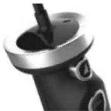 Close-up of a black and silver mechanical component with a handle and circular base (no visible text or symbols)