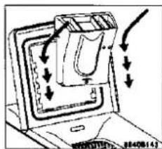 Diagram showing a device with arrows indicating motion or force, possibly illustrating a mechanical or electrical system.