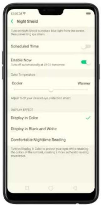 12:00:54 Night Shield Turn on Night Shield to reduce blue light from the screen. Then preventing eye stairs. Scheduled Time Enable Now Turn off australically at 07:00 tomorrow Color Temperature Cooler Warmer Adjust to fit your desired eye protection effect. DISPLAY EFFECT Display in Color Display in Black and White Comfortable Nighttime Reading Turn on Display in Color to protect your eyes while retaining the colors of the current, creating a more authentic reading sequence.
