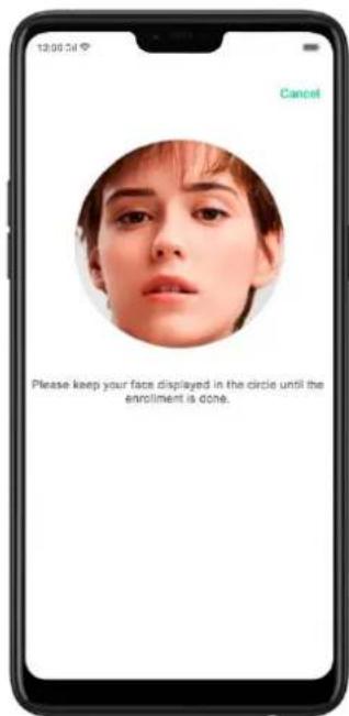 12:00 PM Cancel Please keep your face displayed in the circle until the enrollment is done.
