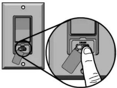 Diagram showing a hand inserting a USB into a floppy disk, with magnified view highlighting the component.