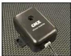 Close-up of a black GAX electric sensor device with visible microphone and connector (no text or symbols on body)