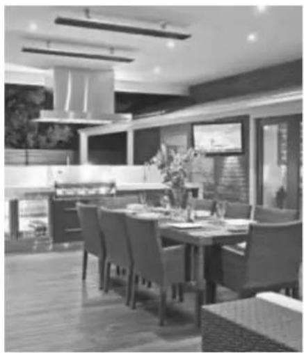 Interior view of a modern dining area with wooden furniture and ceiling lighting (no visible text or symbols)