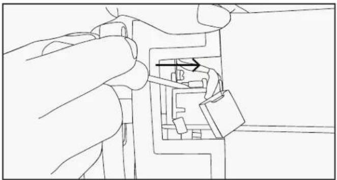 Line drawing of a hand holding a mechanical component with an arrow indicating direction (no text or symbols)