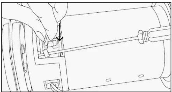 Line drawing of a hand operating a mechanical component with a tool, no text or symbols present