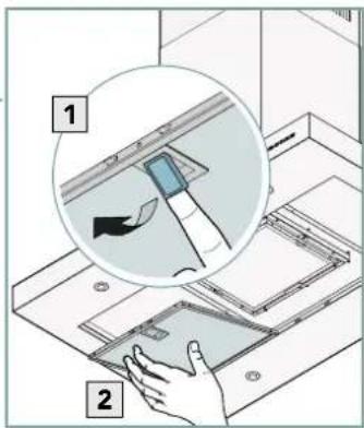 Diagram showing a hand inserting a device into a device with an inset magnified view highlighting the component.