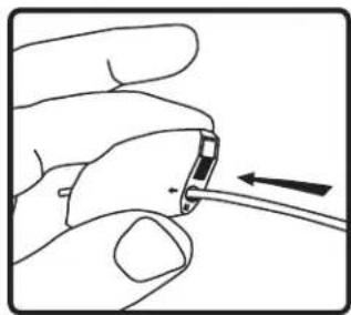 Hand holding a small electronic component with an arrow indicating direction (no text or symbols)