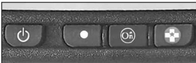 Close-up of a keyboard key with power, battery, and function icons (no readable text or symbols beyond standard symbols)