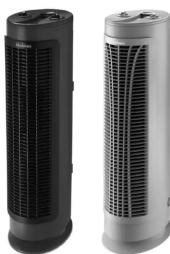 Two industrial air purifiers side by side, one black and one silver, with no visible text or symbols.