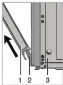 Diagram showing a mechanical or structural component with numbered parts and an arrow indicating direction