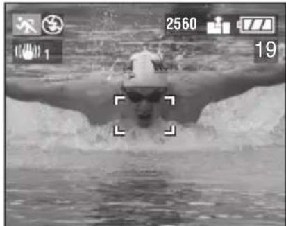 Swimmer in pool with digital camera interface overlay (no readable text or symbols)