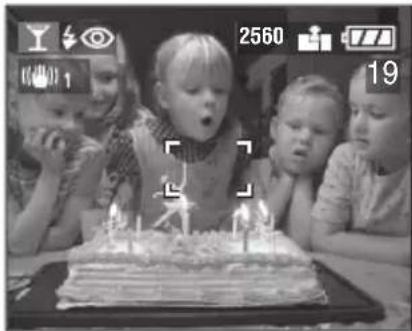 Children celebrating with a birthday cake and camera interface overlays (no readable text or symbols)