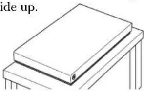 Simple line drawing of a stack of books on a table (no text or symbols)