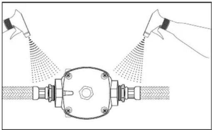 Diagram of spray application in a mechanical component with two sprayers spraying particles (no text or symbols)