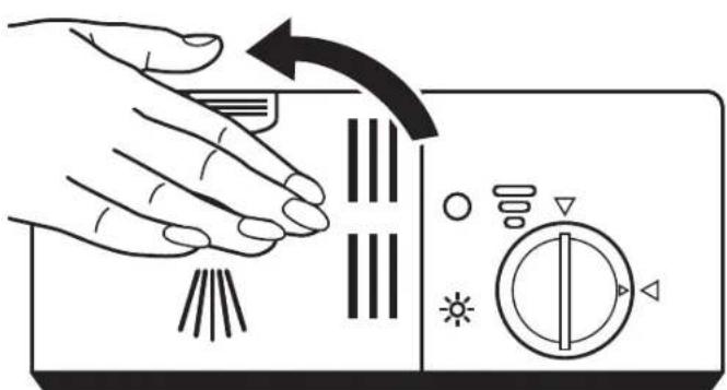 Diagram showing hand pressing down on a control panel with icons for lighting, buttons, and switches
