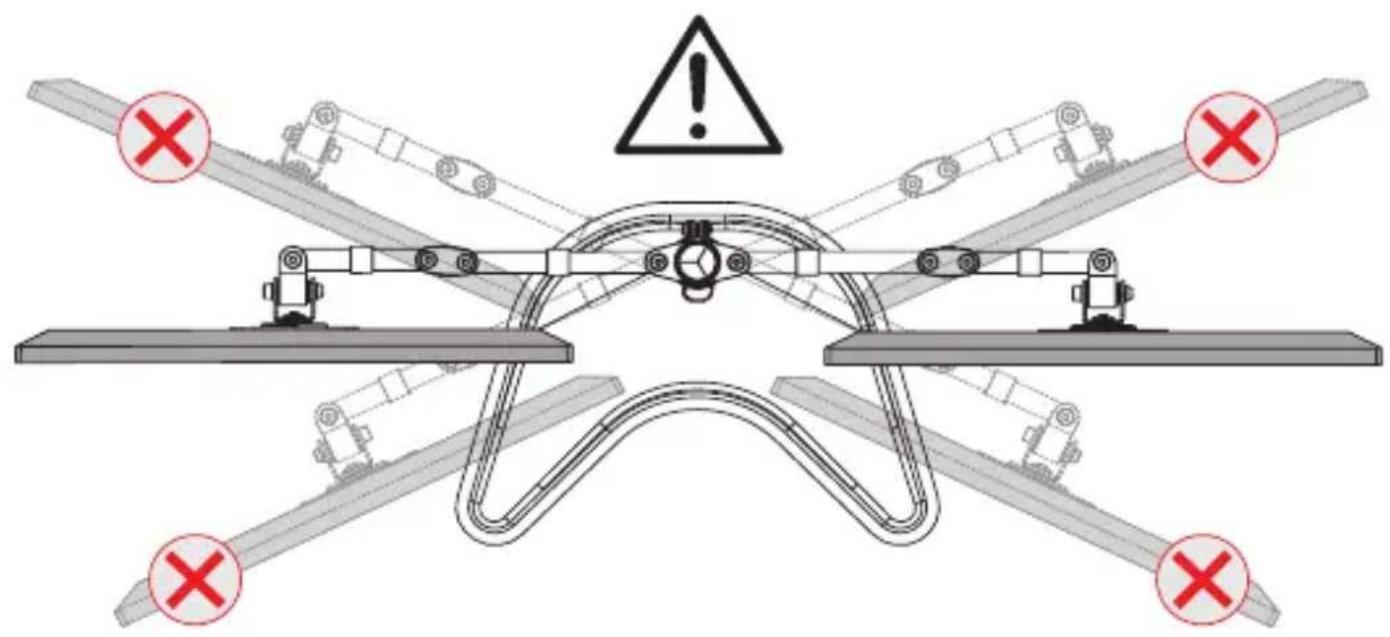 Diagram of a drone with warning symbols and crosshair indicators, showing mechanical components and an explosion symbol.