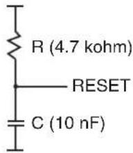 Circuit diagram with resistor, reset, and capacitor components labeled with values