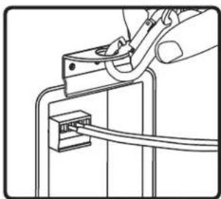 Line drawing of a hand using a power tool to adjust or install an RJ45 connector (no text or symbols present).