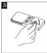 Hand holding a small electronic device with a scroll wheel (no text or symbols visible)