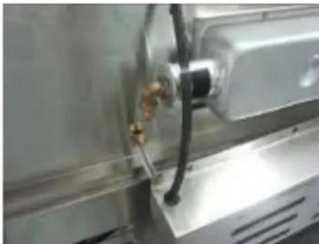 InAlto IBBQBI6B - Remove the LPG jet from the elbow shaped brass injector assembly. - 2