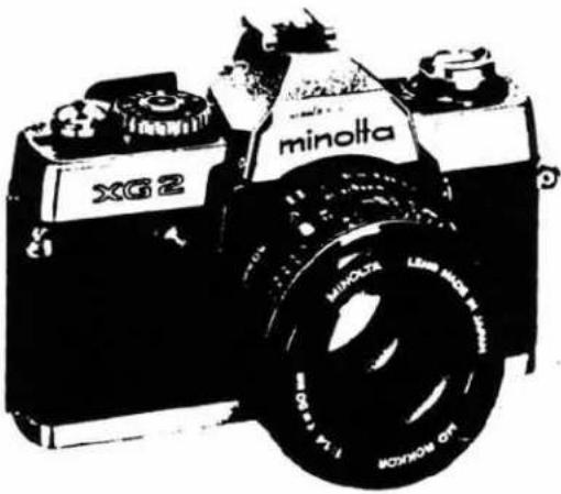 MINOLTA XG E - FILM FEED - 1
