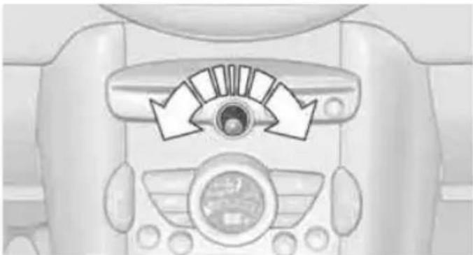 Top-down view of a car dashboard with directional arrows indicating airflow or movement (no text or symbols)