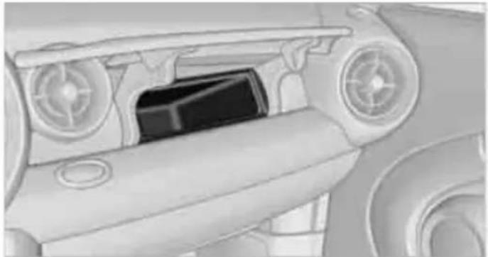 Close-up of a car dashboard and steering wheel (no visible text or symbols)